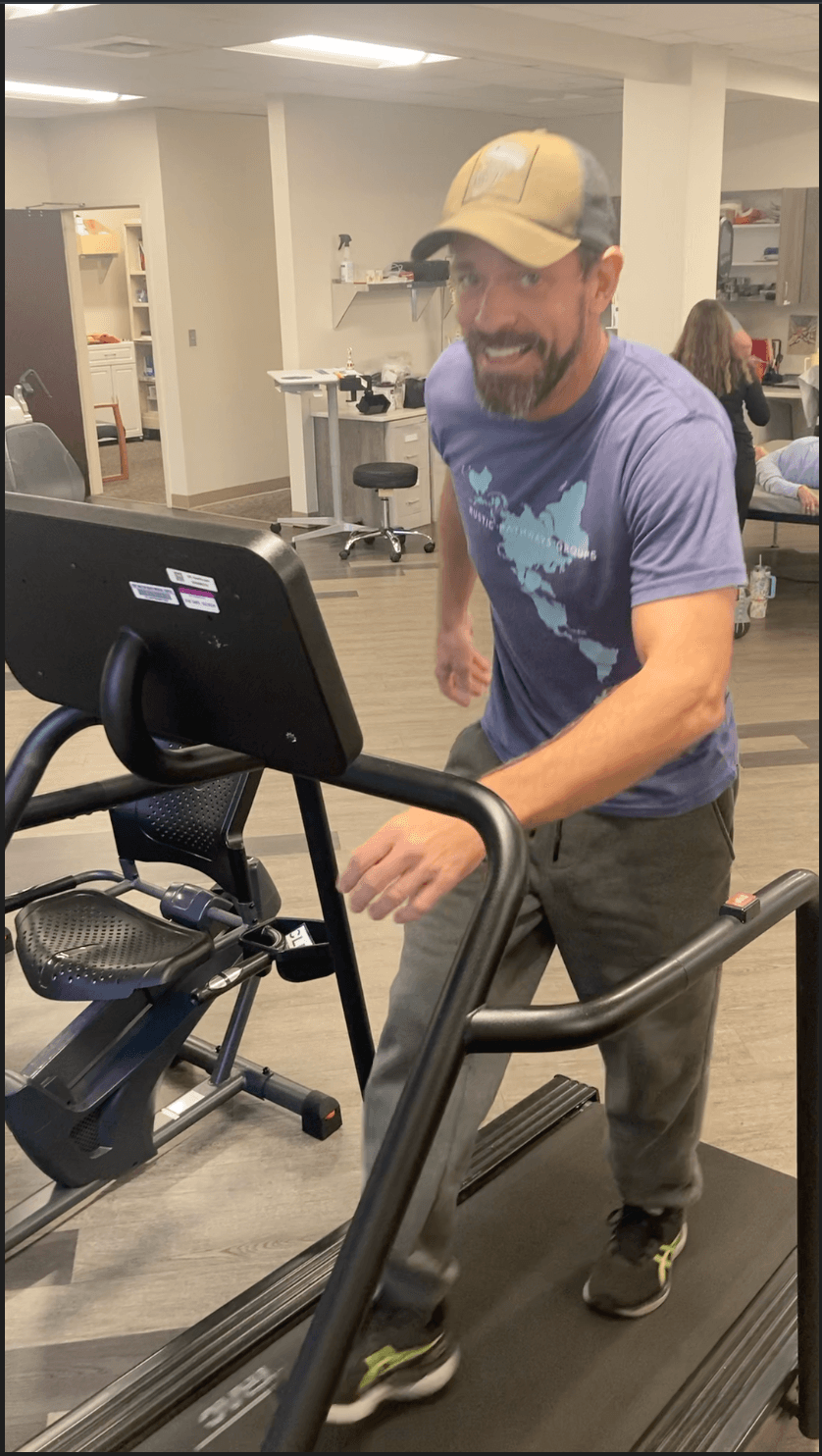 Michael Cavett on a treadmill during recovery