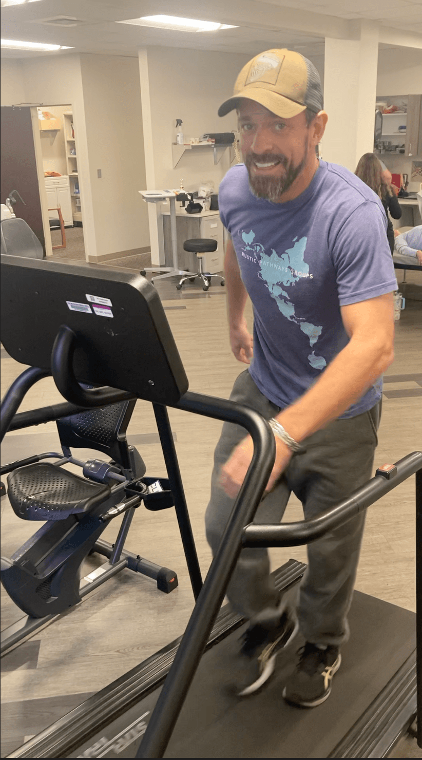Michael Cavett on a treadmill during recovery